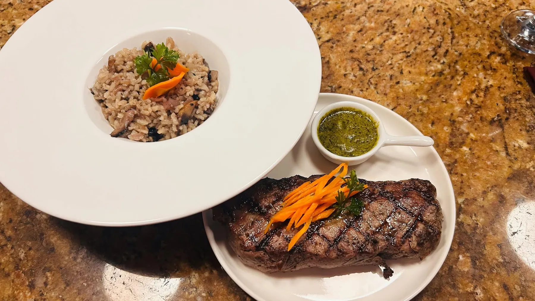 Grilled steak with chimichurri and risotto at Sterling's