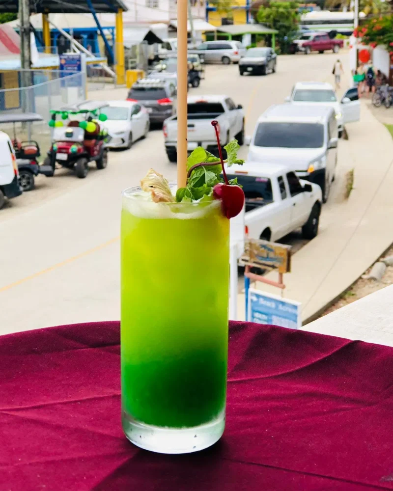 A bright green cocktail over Main Street